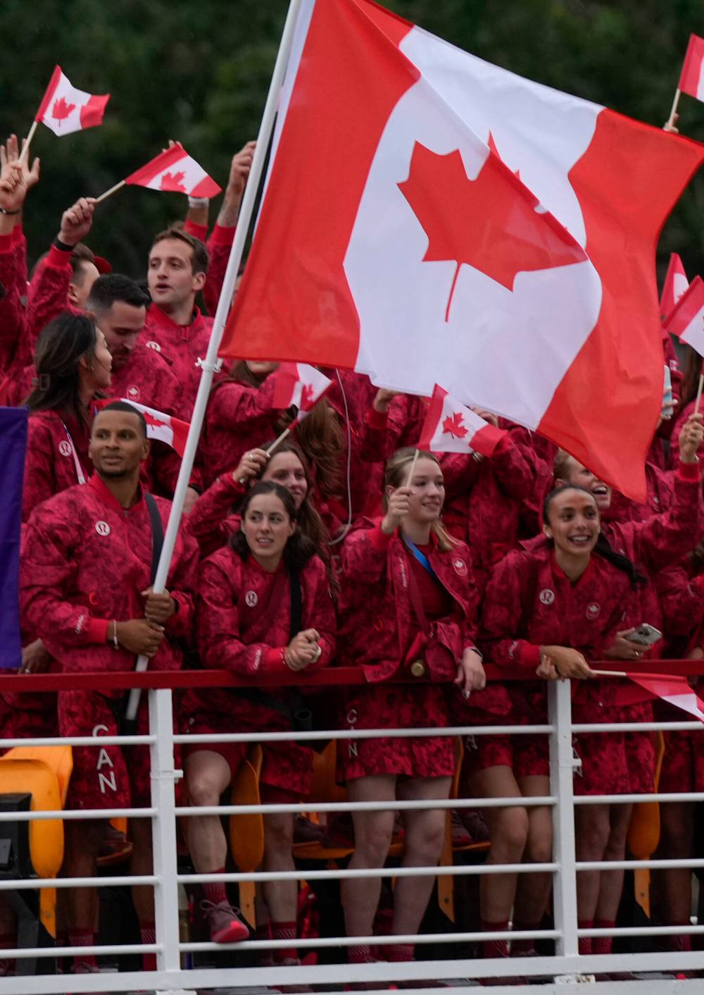 LUCA BRUNO / THE ASSOCIATED PRESS
                                Winnipeg’s Sklar Park (right) was front and centre on the Team Canada barge Friday during the Olympics opening ceremony in Paris.