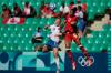Silvia Izquierdo / The Associated Press
                                Canada’s Jade Rose (right) and New Zealand’s Katie Kitching vie for the ball Thursday in Olympic action.