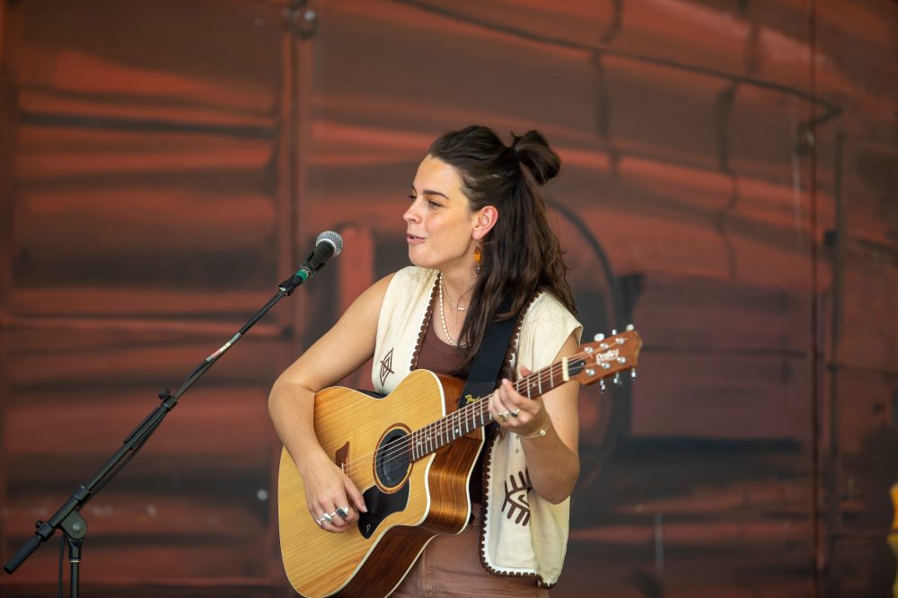 BROOK JONES / FREE PRESS
Steph Strings, who is a musician based in Melbourne, Australia, perform on the Little Stage In The Forest Sunday.