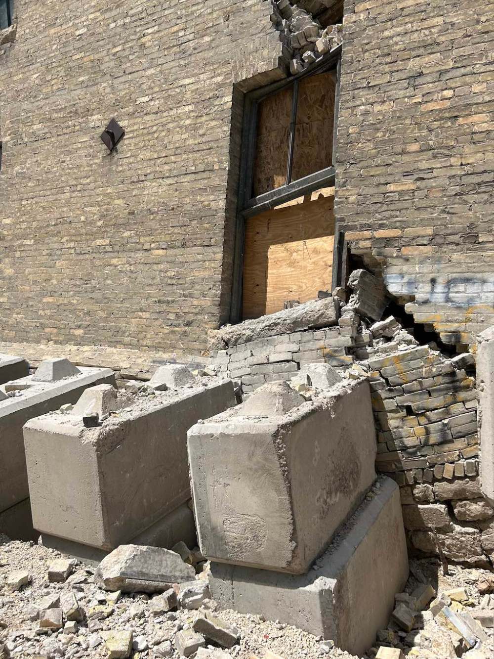 Tyler Searle / Free Press
Large concrete blocks line the east exterior wall in an apparent effort to support the structure and prevent a collapse.