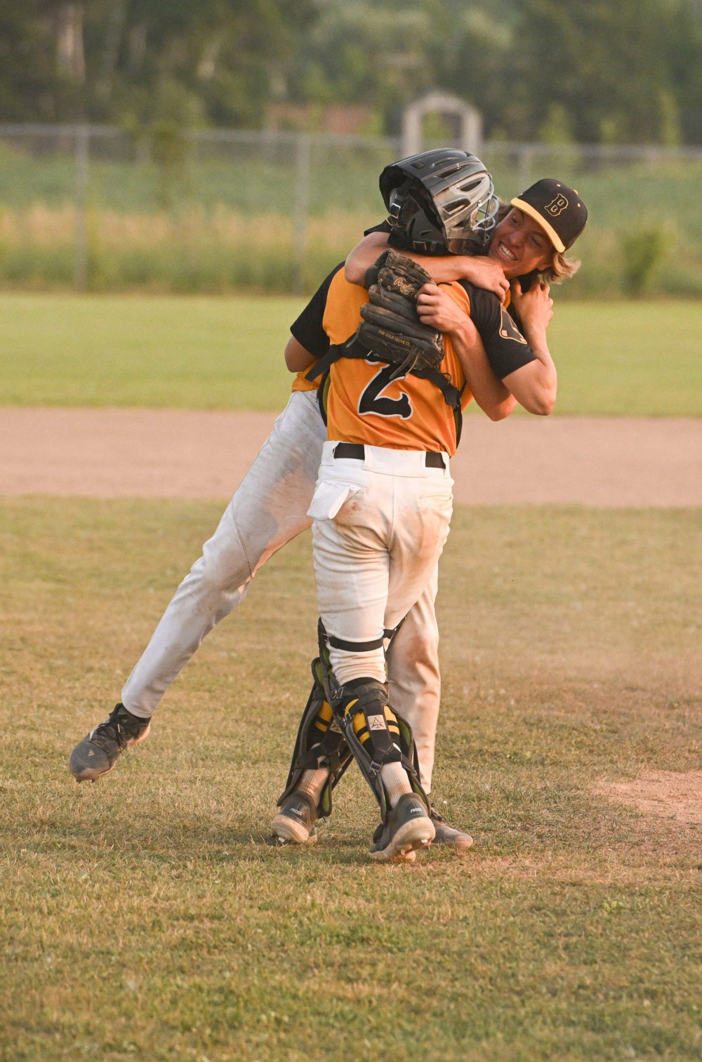 Bonivitals Cal Lagace and Benjamin Graham share a moment after their team wins the Tier 2 AAA U18 Baseball Manitoba Provincial Championships. (Mike Sudoma / Free Press)
