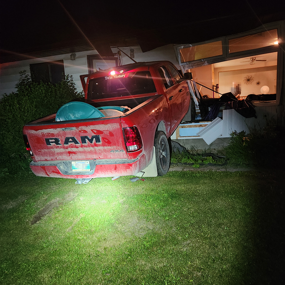 Police are looking for the occupants of a truck that drove into a Thompson home and caused significant damage Saturday. (Supplied)