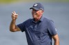 Matt Kuchar reacts after making his putt on the 18th green during the final round of the 3M Open golf tournament at the Tournament Players Club, Sunday, July 28, 2024, in Blaine, Minn. (AP Photo/Charlie Neibergall)