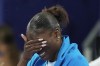 Julien Alfred, of Saint Lucia, reacts after winning the women's 100-meter final at the 2024 Summer Olympics, Saturday, Aug. 3, 2024, in Saint-Denis, France. (AP Photo/Rebecca Blackwell)