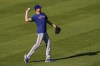 FILE - Texas Rangers pitcher Jacob deGrom works out prior to a baseball game against the Baltimore Orioles, in Baltimore, May 26, 2023. (AP Photo/Julio Cortez, File)
