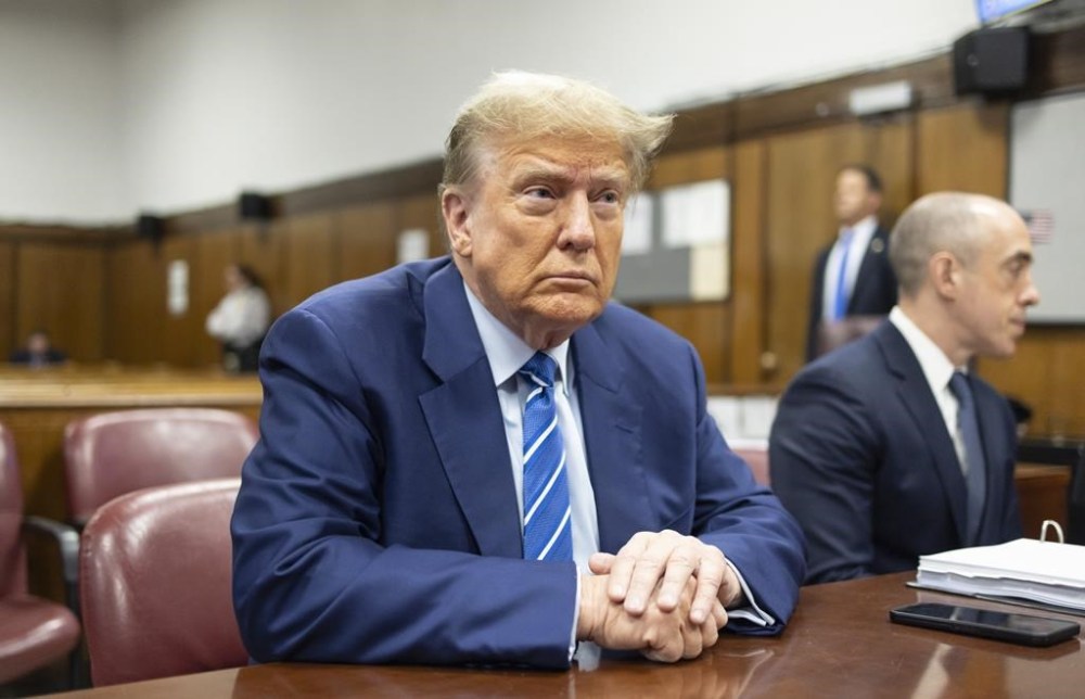 FILE - Former President Donald Trump awaits the start of proceedings on the second day of jury selection at Manhattan criminal court, April 16, 2024, in New York. (Justin Lane/Pool Photo via AP)