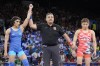 India's Vinesh Vinesh, left, celebrates after defeating Japan's Yui Susaki in the round of 16 of the women's freestyle 50kg wrestling match, at Champ-de-Mars Arena, during the 2024 Summer Olympics, Tuesday, Aug. 6, 2024, in Paris, France. (AP Photo/Eugene Hoshiko)
