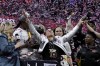 FILE - South Carolina head coach Dawn Staley celebrates after the Final Four college basketball championship game against Iowa in the women's NCAA Tournament, Sunday, April 7, 2024, in Cleveland. (AP Photo/Morry Gash, File)