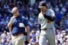 Minnesota Twins starting pitcher Joe Ryan, right, reacts as he leaves with a team trainer after an injury during the third inning of a baseball game against the Chicago Cubs in Chicago, Wednesday, Aug. 7, 2024. (AP Photo/Nam Y. Huh)