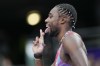 Noah Lyles, of the United States, competes during the men's 200-meter semifinal at the 2024 Summer Olympics, Wednesday, Aug. 7, 2024, in Saint-Denis, France. (AP Photo/Bernat Armangue)