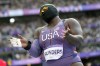 Raven Saunders, of the United States, competes during the women's shot put qualification at the 2024 Summer Olympics, Thursday, Aug. 8, 2024, in Saint-Denis, France. (AP Photo/Bernat Armangue)