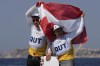 Lara Vadlau and Lukas Maehr of Austria celebrate after the 470 mixed dinghy medal race during the 2024 Summer Olympics, Thursday, Aug. 8, 2024, in Marseille, France. (AP Photo/Carolyn Kaster)
