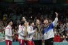 FILE - South Korea's Lim Jonghoon, right, takes a selfie with North Korea's Ri Jong Sik, left, and Kim Kum, second left, China's Wang Chuqin, background, and Sun Yingsha, center, and his teammate Shin Yubin, right, and Lim Jonghoon during the medal ceremony at the 2024 Summer Olympics, July 30, 2024, in Paris, France. (AP Photo/Petros Giannakouris, File)