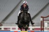 FILE - Elodie Clouvel of France competes in the horse jumping portion of the women's modern pentathlon at the 2020 Summer Olympics, Friday, Aug. 6, 2021, in Tokyo, Japan. On Sunday at the Paris Olympics, a 112-year-old cavalry officer will ride for the last time. The sport of modern pentathlon, a niche outlier at the Olympics, is getting rid of its horses after more than a century, and a notorious incident when a coach struck a horse at the last Games. (AP Photo/Andrew Medichini, File)