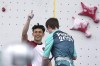 Veddriq Leonardo of Indonesia, left, reacts after competing in the men's speed final during the sport climbing competition at the 2024 Summer Olympics, Thursday, Aug. 8, 2024, in Le Bourget, France. (AP Photo/Tsvangirayi Mukwazhi)