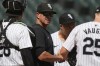 Chicago White Sox manager Pedro Grifol reacts as he talks to players while waiting for Chicago White Sox relief pitcher Fraser Ellard during the ninth inning of a baseball game against the Kansas City Royals in Chicago, Wednesday, July 31, 2024. The Royals won 10-3. (AP Photo/Nam Y. Huh)