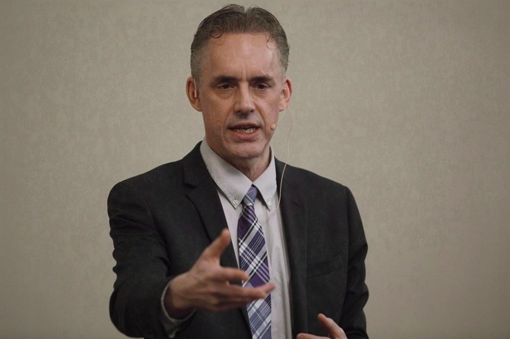 Jordan Peterson speaks to a crowd during a stop in Sherwood Park, Alta, on Sunday Feb. 11, 2018. Canada's top court has closed the door on Peterson's legal fight against an order that he enter a remedial coaching program.THE CANADIAN PRESS/Jason Franson