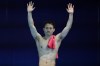 China's Xie Siyi waves as he competes in the men's 3m springboard diving final, at the 2024 Summer Olympics, Thursday, Aug. 8, 2024, in Saint-Denis, France. (AP Photo/Lee Jin-man)