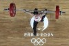 Maude Charron of Canada competes during the women's 59kg weightlifting event at the 2024 Summer Olympics, Thursday, Aug. 8, 2024, in Paris, France. THE CANADIAN PRESS/AP/Dita Alangkara,Pool