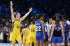 Sami Whitcomb (32), of Australia, celebrates after Australia defeated France in a women's basketball game at the 2024 Summer Olympics, Sunday, Aug. 4, 2024, in Villeneuve-d'Ascq, France. (AP Photo/Mark J. Terrill)