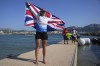 Ellie Aldridge of Britain celebrates after winning the women's kite final race during the 2024 Summer Olympics, Thursday, Aug. 8, 2024, in Marseille, France. (AP Photo/Daniel Cole)