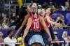 Players for the United States celebrate during a semifinal women's volleyball match against Brazil at the 2024 Summer Olympics, Thursday, Aug. 8, 2024, in Paris, France. (AP Photo/Dolores Ochoa)