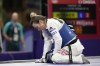 Britain's Jade Jones reacts as she competes with North Macedonia's Miljana Reljikj in a women's 57kg Taekwondo match during the 2024 Summer Olympics, at the Grand Palais, Thursday, Aug. 8, 2024, in Paris, France. (AP Photo/Andrew Medichini)