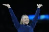 Jade Carey, of the United States, celebrates after winning the bronze medal during the medal ceremony after the women's artistic gymnastics individual vault finals at Bercy Arena at the 2024 Summer Olympics, Saturday, Aug. 3, 2024, in Paris, France. (AP Photo/Francisco Seco)