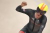 Ethan Hayter of Britain celebrates after winning the men's omnium elimination race, at the Summer Olympics, Thursday, Aug. 8, 2024, in Paris, France. (AP Photo/Thibault Camus)