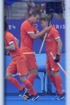 Netherlands Koen Bijen, right, celebrates after scoring his side's first goal during the men's gold medal field hockey match between Germany and Netherlands at the Yves-du-Manoir Stadium during the 2024 Summer Olympics, Thursday, Aug. 8, 2024, in Colombes, France. (AP Photo/ Anjum Naveed)
