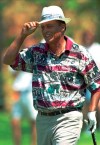 FILE - Chi Chi Rodriquez gives a tip of the hat to the gallery at the ninth at the TCP at Piper Glen course in Charlotte, N.C. during the Paine Webber Invitational Pro-Am, Thursday, May 2, 1996. (AP Photo/Peter A. Harris, File)