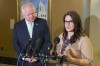 FILE - Minnesota Lt. Gov. Peggy Flanagan, right, and Gov. Tim Walz speak to reporters at the State Capitol in St. Paul, Minn., Monday, March 21, 2022. (Mohamed Ibrahim/Report for America via AP, File)