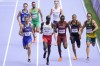 Gabriel Tual, of France, and Marco Arop, of Canada, run to qualify in a men's 800 meters semifinal at the 2024 Summer Olympics, in Saint-Denis, France, Friday, Aug. 9, 2024. THE CANADIAN PRESS/AP-Ashley Landis