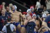 Serbia players celebrate after winning a men's semifinal match between Serbia and USA, at the 2024 Summer Olympics, Friday, Aug. 9, 2024, in Paris. (AP Photo/Luca Bruno)