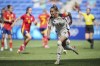 Germany's Giulia Gwinn celebrates after scoring during the women's bronze medal soccer match between Spain and Germany, at the Lyon stadium, during the 2024 Summer Olympics, Friday, Aug. 9, 2024, in Decines, France. (AP Photo/Laurent Cipriani)