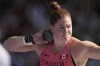 Sarah Mitton, of Canada, competes during the women's shot put qualification at the 2024 Summer Olympics, Thursday, Aug. 8, 2024, in Saint-Denis, France. Hundreds of people are expected to pack a theatre in Liverpool, N.S., this afternoon to watch local athlete Sarah Mitton on the big screen as she vies for gold in the Olympic shot put finals in Paris. (AP Photo/Ashley Landis)