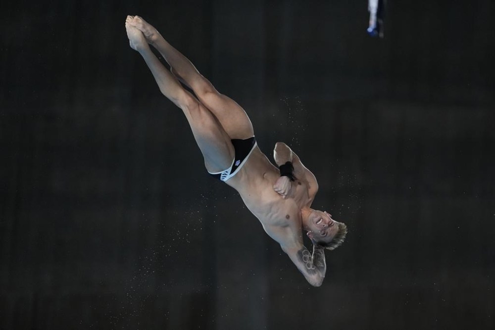 FILE - Germany's Timo Barthel competes in the men's 10m platform diving preliminary, at the 2024 Summer Olympics, Friday, Aug. 9, 2024, in Saint-Denis, France. (AP Photo/Lee Jin-man, File)