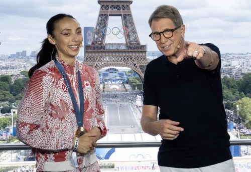 Broadcaster Scott Russell speaks with taekwondo bronze medallist Skylar Park from a television network booth at the Summer Olympics, in Paris, Friday, Aug. 9, 2024. THE CANADIAN PRESS/Adrian Wyld