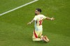 Spain's Alex Baena celebrates after scoring his side's third goal during the men's soccer gold medal match between France and Spain at the Parc des Princes during the 2024 Summer Olympics, Friday, Aug. 9, 2024, in Paris, France. (AP Photo/Vadim Ghirda)