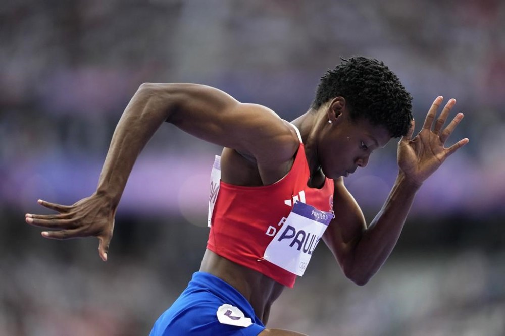 Marileidy Paulino, of the Dominican Republic, starts in the women's 400 meters final at the 2024 Summer Olympics, Friday, Aug. 9, 2024, in Saint-Denis, France. (AP Photo/Ashley Landis)