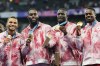 Canada's men's 4 x 100m relay team Andre De Grasse, left to right, Brendon Rodney, Jerome Blake and Aaron Brown celebrate with their gold medals on the podium during the Paris Summer Olympics in Saint-Denis, France, Friday, Aug. 9, 2024. THE CANADIAN PRESS/Nathan Denette