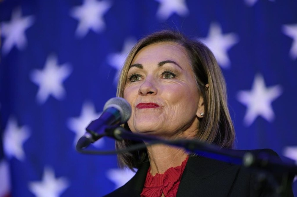 FILE - Iowa Gov. Kim Reynolds speaks to supporters during a Republican Party of Iowa election night rally, Nov. 8, 2022, in Des Moines, Iowa. (AP Photo/Charlie Neibergall, File)