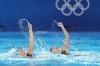 Canada's Audrey Lamothe and Jacqueline Simoneau compete in the duet technical routine of artistic swimming at the 2024 Summer Olympics, Friday, Aug. 9, 2024, in Saint-Denis, France. (AP Photo/Lee Jin-man)