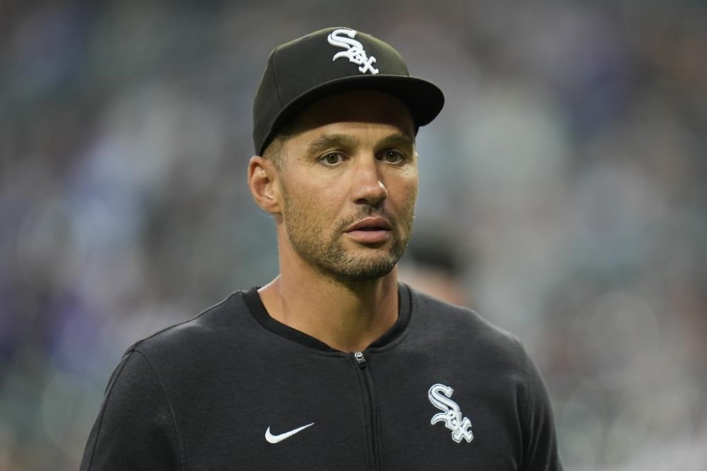 Chicago White Sox interim manager Grady Sizemore walks back to the dugout before a baseball game against the Chicago Cubs, Friday, Aug. 9, 2024, in Chicago. (AP Photo/Erin Hooley)