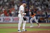Tampa Bay Rays relief pitcher Richard Lovelady walks back to the mound as Baltimore Orioles' Cedric Mullins runs around the bases following his solo home run during the sixth inning of a baseball game Friday, Aug. 9, 2024, in St. Petersburg, Fla. (AP Photo/Christopher O'Meara)