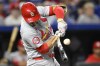 St. Louis Cardinals' Nolan Arenado breaks his bat while hitting into a double play during the fifth inning of a baseball game against the Kansas City Royals, Friday, Aug. 9, 2024, in Kansas City, Mo. (AP Photo/Reed Hoffmann)