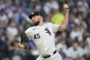 Chicago White Sox starting pitcher Garrett Crochet throws against the Chicago Cubs during the second inning of a baseball game Friday, Aug. 9, 2024, in Chicago. (AP Photo/Erin Hooley)