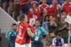 Denmark's Mie Hoejlund, right, and Denmark's Helena Elver celebrate their victory after the bronze medal handball match between Denmark and Sweden at the 2024 Summer Olympics, Saturday, Aug. 10, 2024, in Villeneuve-d'Ascq, France. (AP Photo/Aaron Favila)