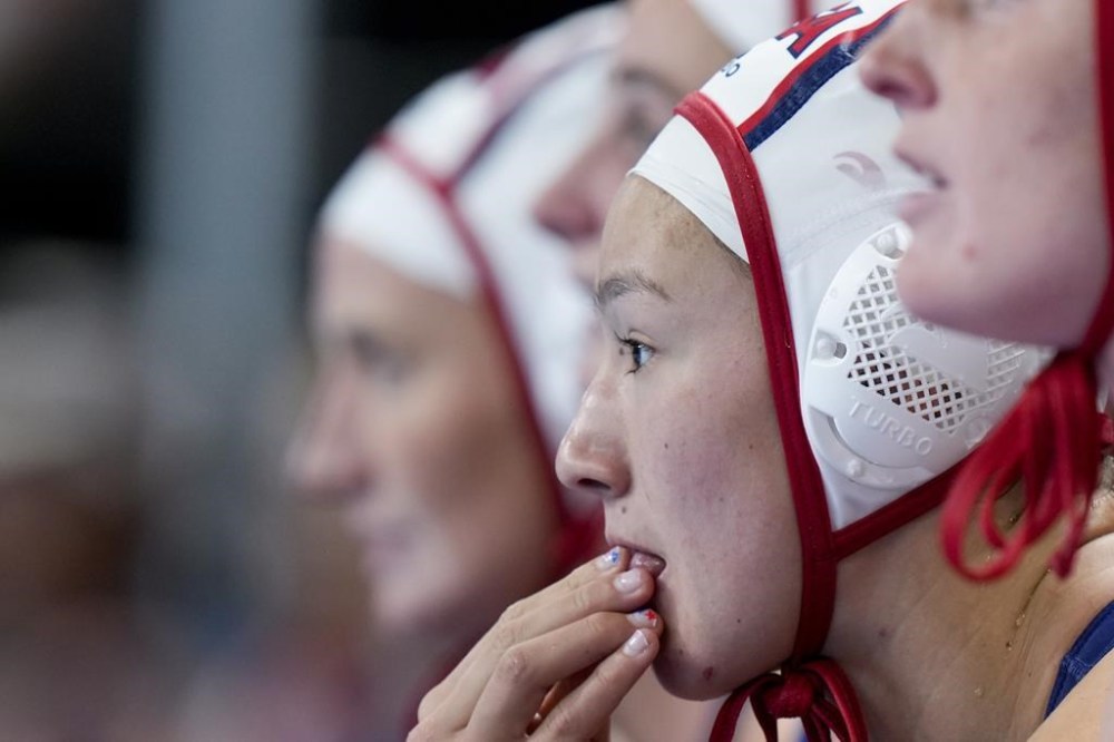 United States' Emily Mary Ausmus sits on the bench during the women's bronze medal water polo match against Netherlands, at the 2024 Summer Olympics, Saturday, Aug. 10, 2024, in Paris, France. (AP Photo/Luca Bruno)