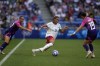 United States' Trinity Rodman fights for the ball with Germany's Felicitas Rauch during a women's semifinal soccer match between the United States and Germany at the 2024 Summer Olympics, Tuesday, Aug. 6, 2024, at Lyon Stadium in Decines, France. (AP Photo/Silvia Izquierdo)